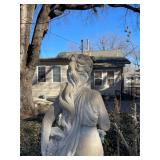 Concrete garden statue of a woman, often referred to as a harvest or autumn statue. Approximately 88 x 18 x 18 in VERY HEAVY will need help and equipment to remove. Easy alley to backyard access.