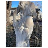 Concrete garden statue of a woman, often referred to as a harvest or autumn statue. Approximately 88 x 18 x 18 in VERY HEAVY will need help and equipment to remove. Easy alley to backyard access.