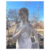 Concrete garden statue of a woman, often referred to as a harvest or autumn statue. Approximately 88 x 18 x 18 in VERY HEAVY will need help and equipment to remove. Easy alley to backyard access.