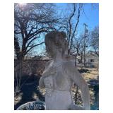 Concrete garden statue of a woman, often referred to as a harvest or autumn statue. Approximately 88 x 18 x 18 in VERY HEAVY will need help and equipment to remove. Easy alley to backyard access.