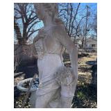 Concrete garden statue of a woman, often referred to as a harvest or autumn statue. Approximately 88 x 18 x 18 in VERY HEAVY will need help and equipment to remove. Easy alley to backyard access.