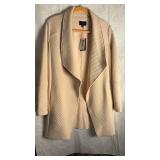 Skies are blue, tufted jacket size extra small new with tags still attached