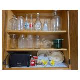 Contents of Cabinet- Quart Canning Jars, Unique Bottles, Dishes, Corn Cob Holders, Spice Tins, and Toaster