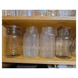 Contents of Cabinet- Quart Canning Jars, Unique Bottles, Dishes, Corn Cob Holders, Spice Tins, and Toaster