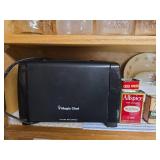 Contents of Cabinet- Quart Canning Jars, Unique Bottles, Dishes, Corn Cob Holders, Spice Tins, and Toaster