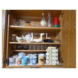Kitchen Cabinet Collection with Decorated Teapot, Coffee Mugs, Carafes, Spice Rack, and More