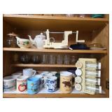 Kitchen Cabinet Collection with Decorated Teapot, Coffee Mugs, Carafes, Spice Rack, and More
