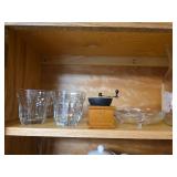Kitchen Cabinet Collection with Decorated Teapot, Coffee Mugs, Carafes, Spice Rack, and More