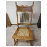 Vintage Carved Wood Rocking Chair with Cane Seat