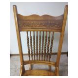 Vintage Carved Wood Rocking Chair with Cane Seat