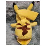 Official Pokemon Pikachu Plush with Brown Bow- Animated Takes 4 Double A Batteries, Not Included
