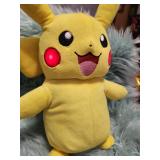 Official Pokemon Pikachu Plush with Brown Bow- Animated Takes 4 Double A Batteries, Not Included