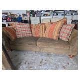 Dark Green Sectional Sofa with Decorative Pillows