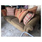 Dark Green Sectional Sofa with Decorative Pillows