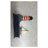 Mechanical Bank Cast Iron - Lighthouse and Sailboat