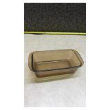 Anchor Hocking Clear Glass Loaf Pan and a Pyrex Brown Loaf Pan