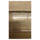 Anchor Hocking Clear Glass Loaf Pan and a Pyrex Brown Loaf Pan