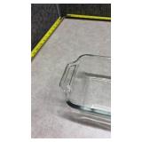 Anchor Hocking Clear Glass Loaf Pan and a Pyrex Brown Loaf Pan