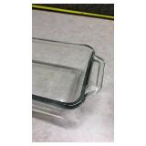 Anchor Hocking Clear Glass Loaf Pan and a Pyrex Brown Loaf Pan