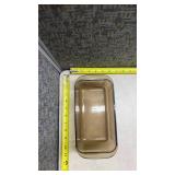 Anchor Hocking Clear Glass Loaf Pan and a Pyrex Brown Loaf Pan