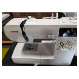 JanomeJW8100 100-Stitch Sewing Machine with Bonus Accessories - Retail: $369