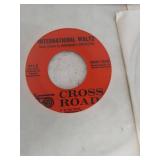 Collection of 45 RPM Records with Wooden Box