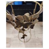 Gold plant pot stand with gold butterflies approximately 20 in tall by 9 in round