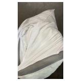 White mattresses topper. Size unknown