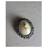 Oval Mother of Pearl Brooch with Floral Frame