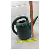Green Plastic Watering Can with Floral Design