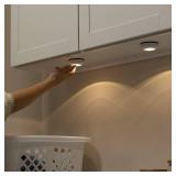 Amazon Basics LED Puck Lights, Battery Operated, 50 Lumens 2 Pack, Tap Light, Stick on Lights, Under Cabinet Lighting, Ideal for Kitchen Cabinets, Closets, Garage and More, White