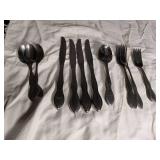 Silver Flatware Set with Wavy Handle Design