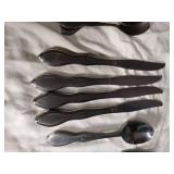 Silver Flatware Set with Wavy Handle Design