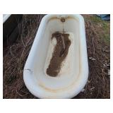 Cast iron bathtub with claw feet