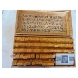 Printers box full of stamps