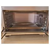 Nuwave Bravo Pro XL Convection Oven and Air Fryer with Probe. MISSING SHELVES. DENTED Inside Top Left Corner.  Door Seems to Shut Correctly. See Last Two Photos. - Retail: $249