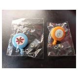 APPEARS NEW - Medical & Floral Clip-On Retractable Badge Reel Set (Includes 2)