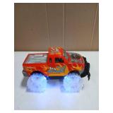 ArtCreativity Light Up Red Monster Truck, 1 Piece, 8 Inch Monster Truck Toy with Flashing LED Tires & Batteries, Push n Go Car Toys for Kids, Fun Gift for Boys & Girls Ages 3 & Up - Retail: $20