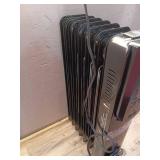 1500-Watt Black Indoor Electric Oil-Filled Radiator Convection Radiant Space Heater with Remote Control for Living Space - Retail: $100