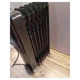 1500-Watt Black Indoor Electric Oil-Filled Radiator Convection Radiant Space Heater with Remote Control for Living Space - Retail: $100