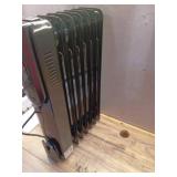 1500-Watt Black Indoor Electric Oil-Filled Radiator Convection Radiant Space Heater with Remote Control for Living Space - Retail: $100