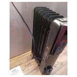 1500-Watt Black Indoor Electric Oil-Filled Radiator Convection Radiant Space Heater with Remote Control for Living Space - Retail: $100