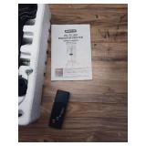 1500-Watt Black Indoor Electric Oil-Filled Radiator Convection Radiant Space Heater with Remote Control for Living Space - Retail: $100