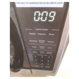 21 in. 1.1 Cu. Ft. 1000-Watt Countertop Microwave Oven in Fingerprint Resistant Stainless Steel and Bar Handle (SEE DETAILS) - Retail: $109