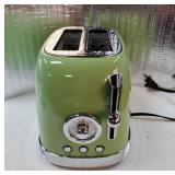 Green Cute Retro Toaster 2 Slice with 1.58 Wide Slots, with Stainless Steel Lid, with Warming Rack, Preheat, Defrost, Countdown Timer Display. 1/4' Dent on Top Right Side. - Retail: $49' Green Cute Retro Toaster 2 Slice with 1.58 Wide Slots, with Stainless Steel Lid, with Warming Rack, Preheat, Defrost, Countdown Timer Display. 1/4' Dent on Top Right Side. - Retail: $49'