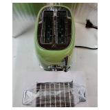 Green Cute Retro Toaster 2 Slice with 1.58 Wide Slots, with Stainless Steel Lid, with Warming Rack, Preheat, Defrost, Countdown Timer Display. 1/4' Dent on Top Right Side. - Retail: $49' Green Cute Retro Toaster 2 Slice with 1.58 Wide Slots, with Stainless Steel Lid, with Warming Rack, Preheat, Defrost, Countdown Timer Display. 1/4' Dent on Top Right Side. - Retail: $49'