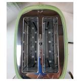 Green Cute Retro Toaster 2 Slice with 1.58 Wide Slots, with Stainless Steel Lid, with Warming Rack, Preheat, Defrost, Countdown Timer Display. 1/4' Dent on Top Right Side. - Retail: $49' Green Cute Retro Toaster 2 Slice with 1.58 Wide Slots, with Stainless Steel Lid, with Warming Rack, Preheat, Defrost, Countdown Timer Display. 1/4' Dent on Top Right Side. - Retail: $49'