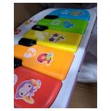 Fisher-Price Portable Baby Chair Kick & Play Deluxe Sit-Me-Up Seat with Piano Learning Toy & Tray for Infants to Toddlers, Purple Monkey