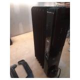 1500-Watt Black Indoor Electric Oil-Filled Radiator Convection Radiant Space Heater with Remote Control for Living Space - Retail: $100