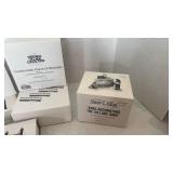 Department 56 Snow Village Collection kids decorating the village sign and fencing